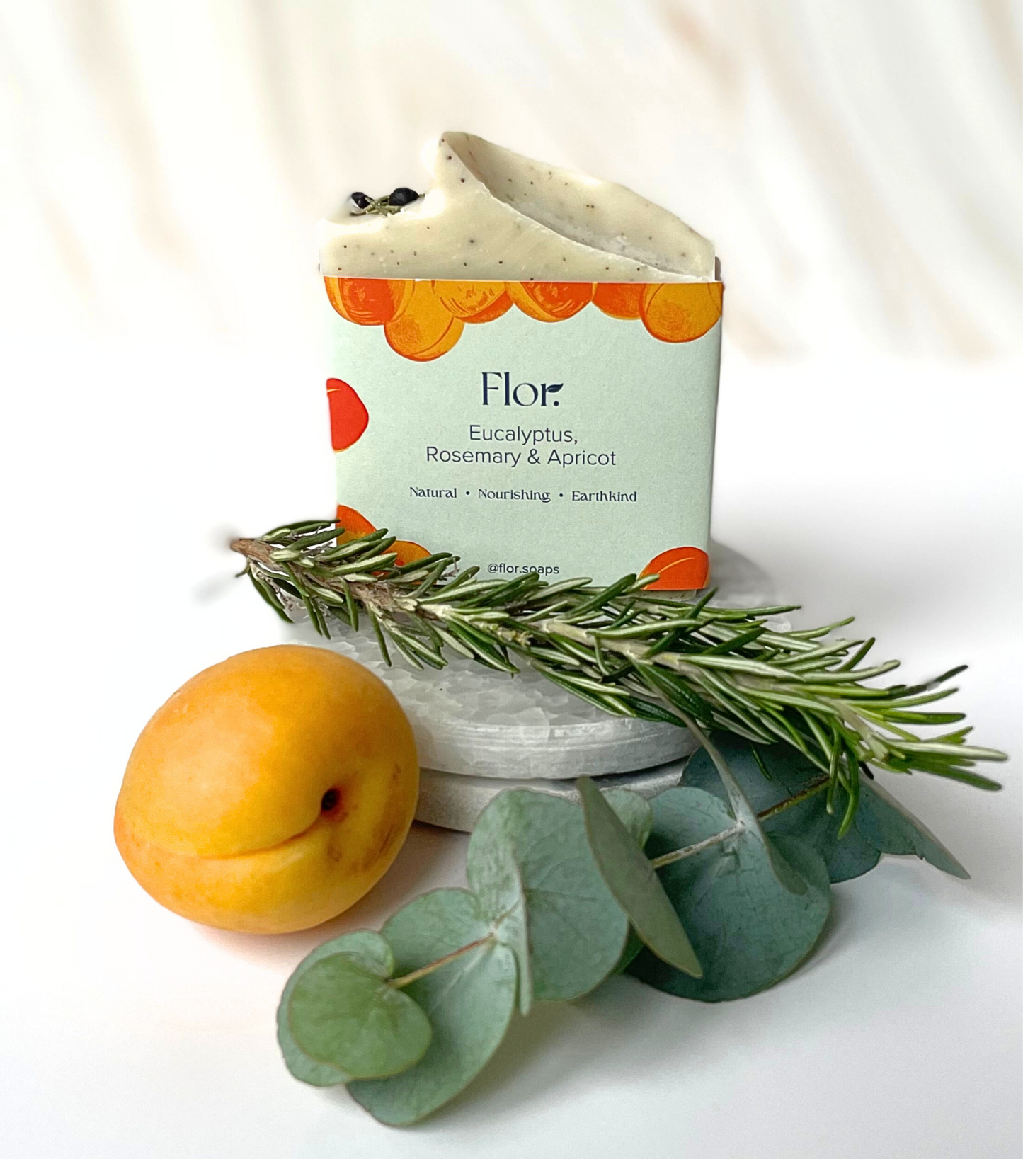 A natural soap bar handcrafted in Scotland using essentials oils, pure and clean ingredients. This bar uses ground apricot stones as a natural exfoliator. It is beautifully decorated with dried rosemary and juniper berries and in wrapped in a colourful branded soap label.