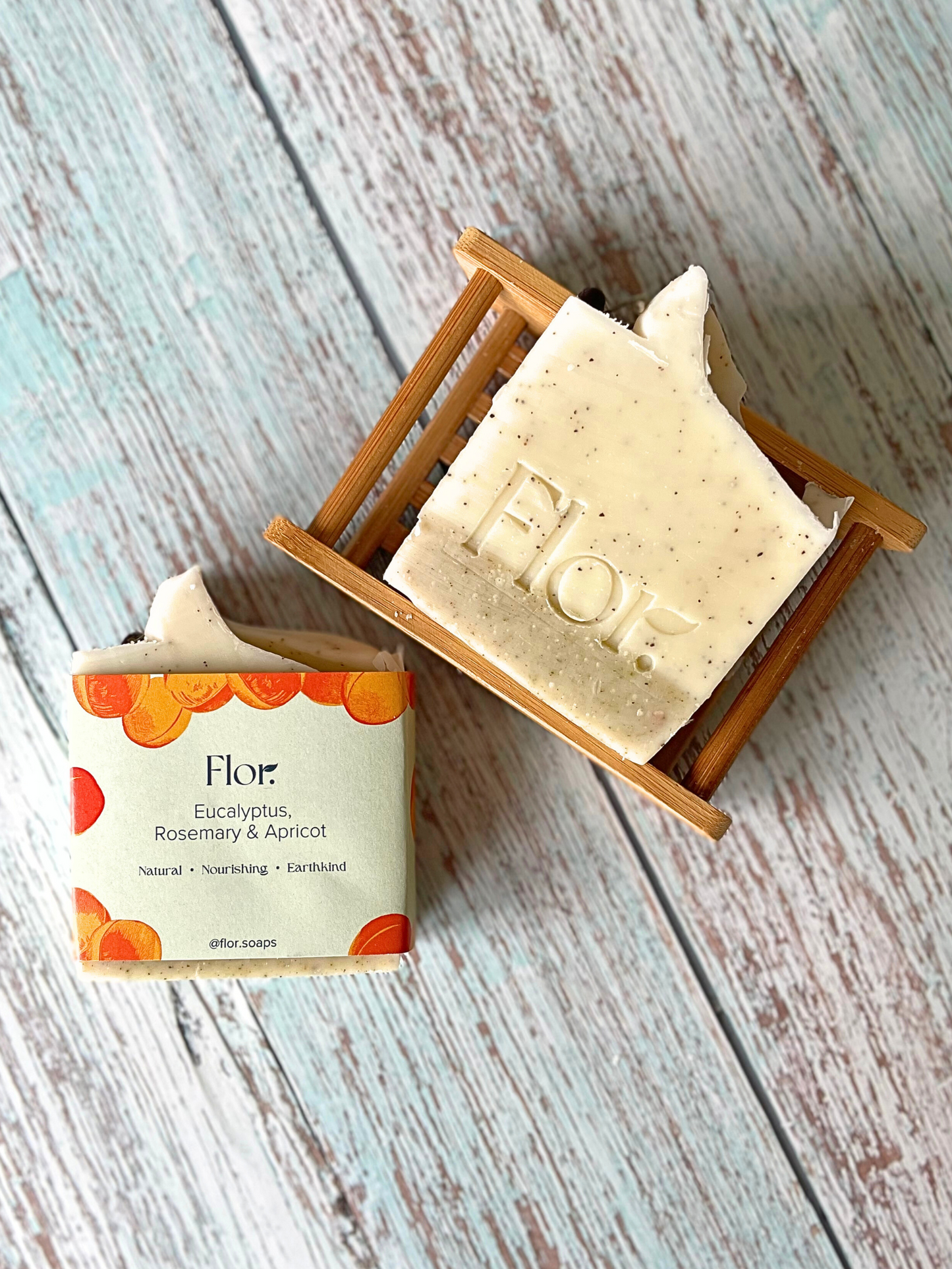 Natural, handmade soap, vegan soap. Essential oils include eucalyptus and rosemary. Ground apricot stones for a natural exfoliator. Decorated with dried rosemary and juniper berries and wrapped in a colourful soap label with bespoke illustrations of apricots. Handmade soap UK. Made by a handmade soap compnay based in Scotland.