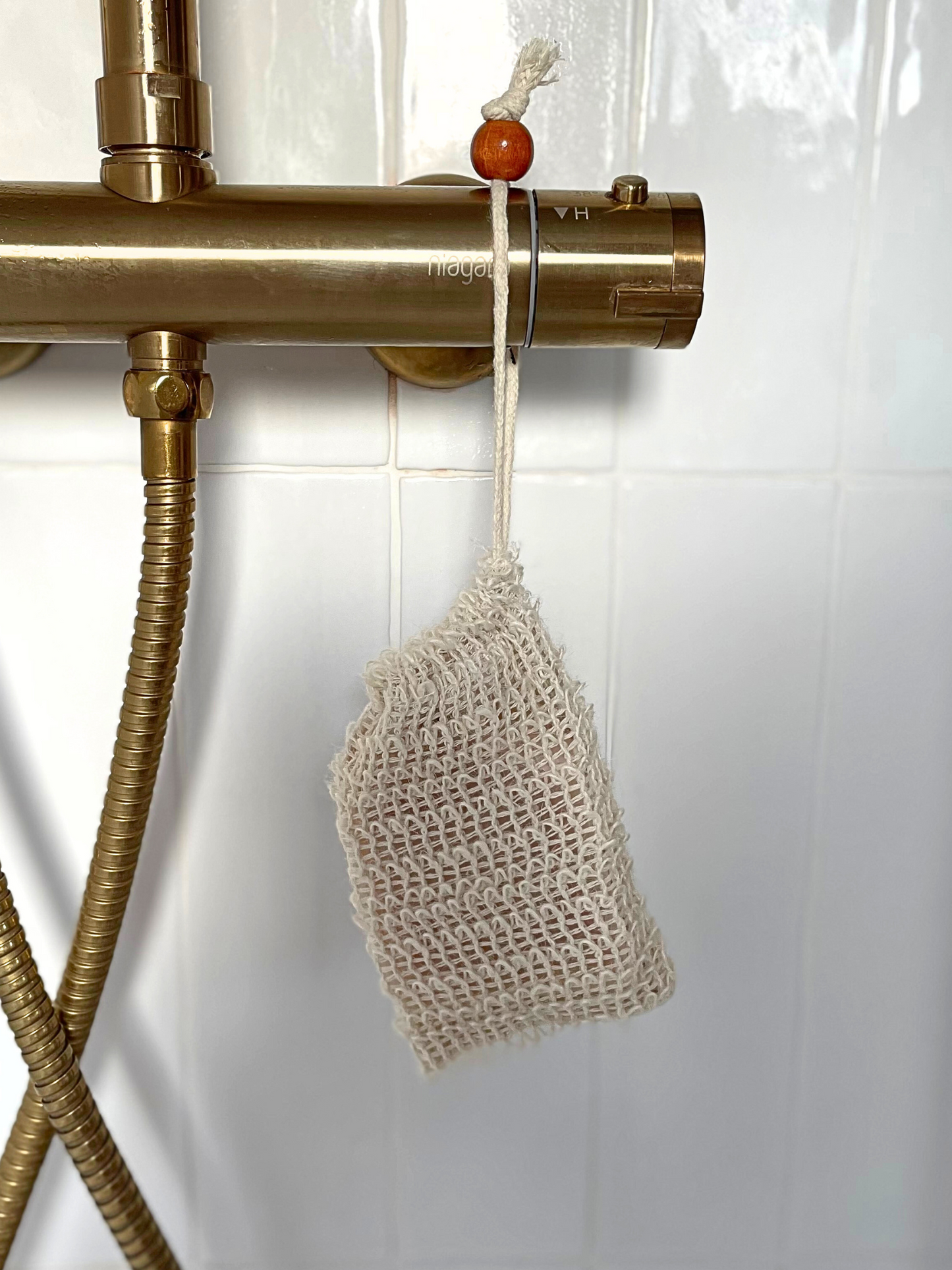 A sisal soap pouch is a eco-friendly option for storing your natural soap bar.  This beige pouch can hang in your shower for you to use with your soap bar inside. It is a natural skin exfoliant and can improve blood circulation. 