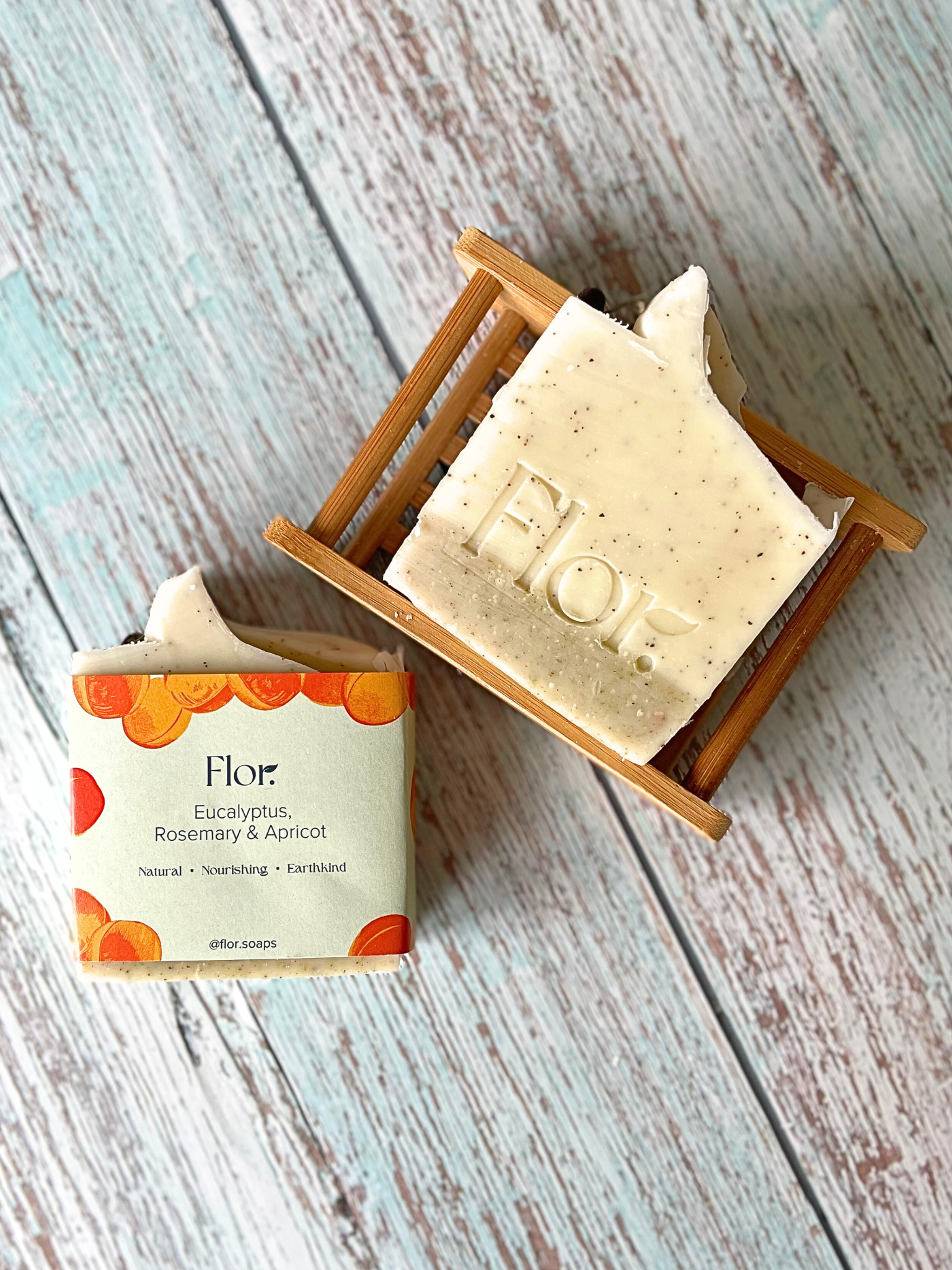 Natural, handmade soap, vegan soap.  Essential oils include eucalyptus and rosemary.  Ground apricot stones for a natural exfoliator. Decorated with dried rosemary and juniper berries and wrapped in a colourful soap label with bespoke illustrations of apricots.  Handmade soap UK. Made by a handmade soap compnay based in Scotland.